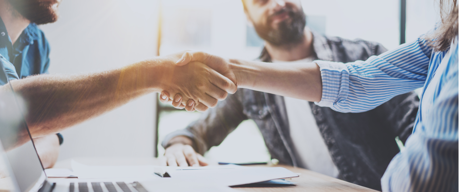 business people shaking hands on a new partnership