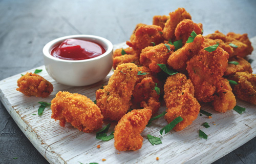 A plate of chicken nuggets