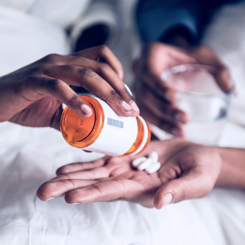 patient taking medication in a hospital